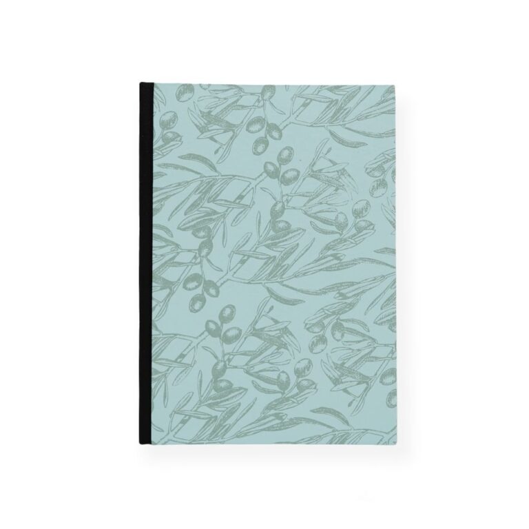 Notebook with a leaf pattern on a light blue background