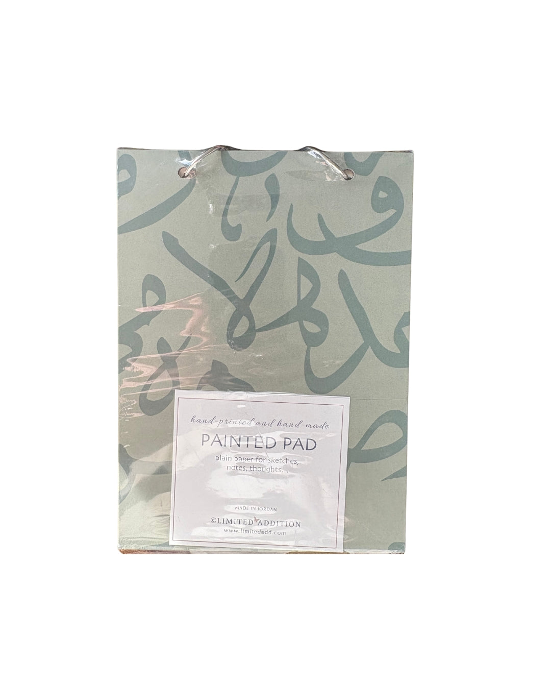 Painted Pad with Arabic calligraphy design on a white background