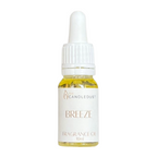 Bottle of Candle Dust Breeze fragrance oil on a white background