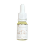 Bottle of Champagne Rhubarb fragrance oil with a white dropper on a white background