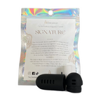Car air freshener fragrance capsule with holographic packaging on a white background