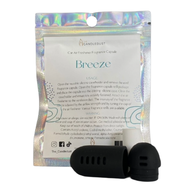 Car air freshener fragrance capsule with packaging and black silicone diffusers on a white background