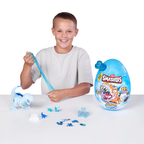 Child playing with Smashers toy set on a white background