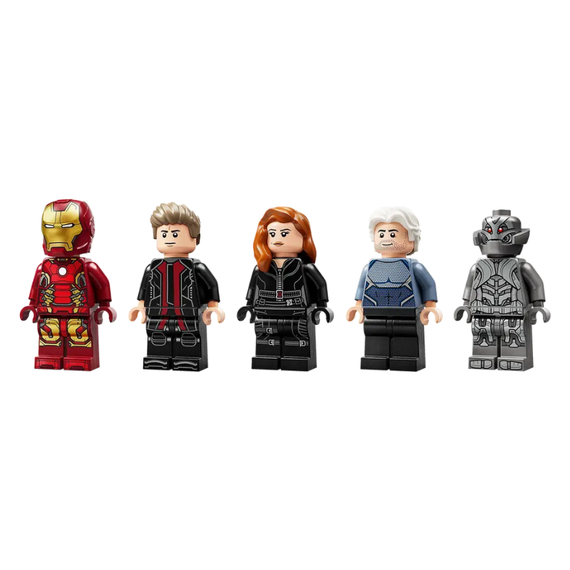 Five LEGO minifigures in superhero costumes on a white background