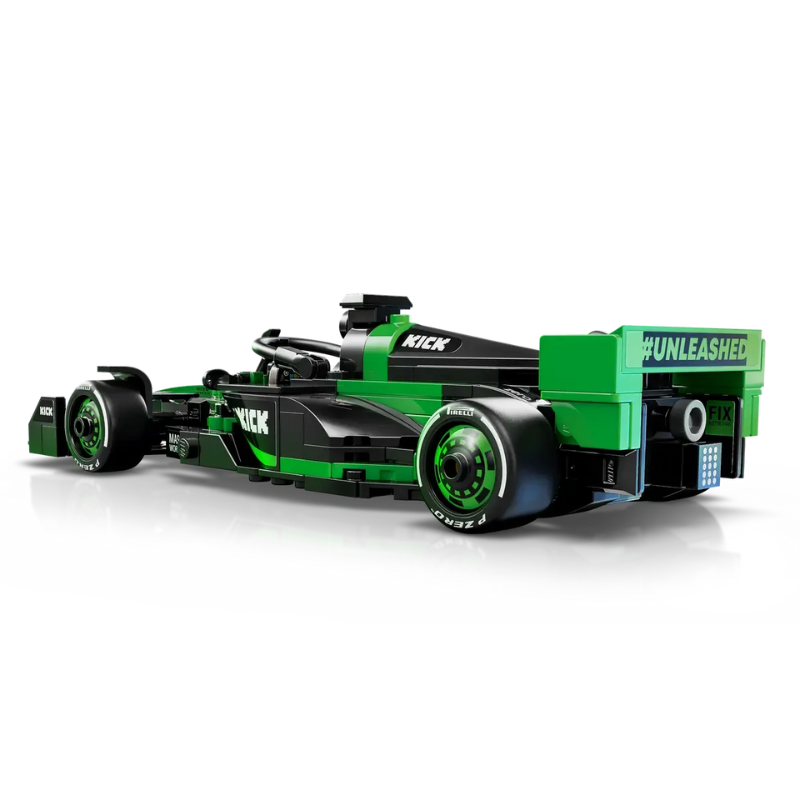 Green and black toy Formula 1 car on a white background