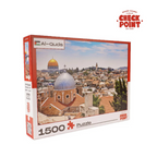 Jigsaw puzzle box with a scenic view of a city and 'Al-Quds' branding on a white background.