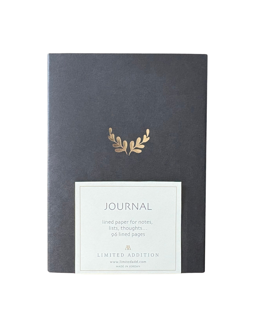 Journal with gold leaf design on a white background