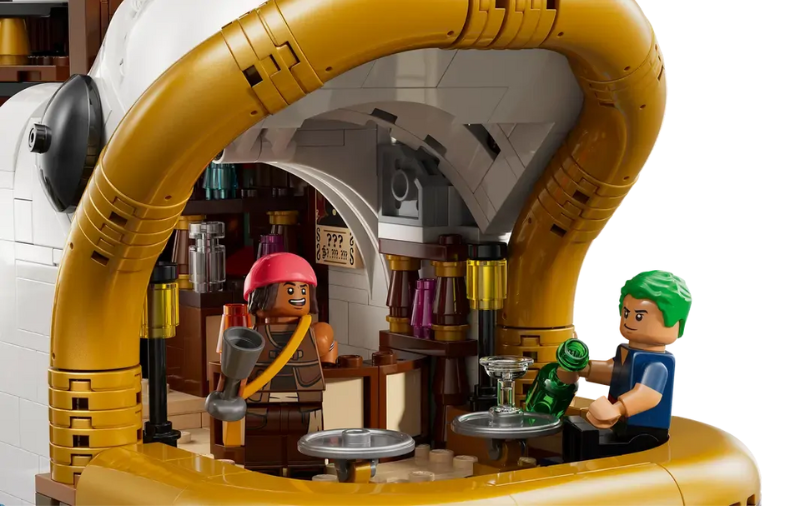 LEGO model of a spacecraft interior with two figures inside.