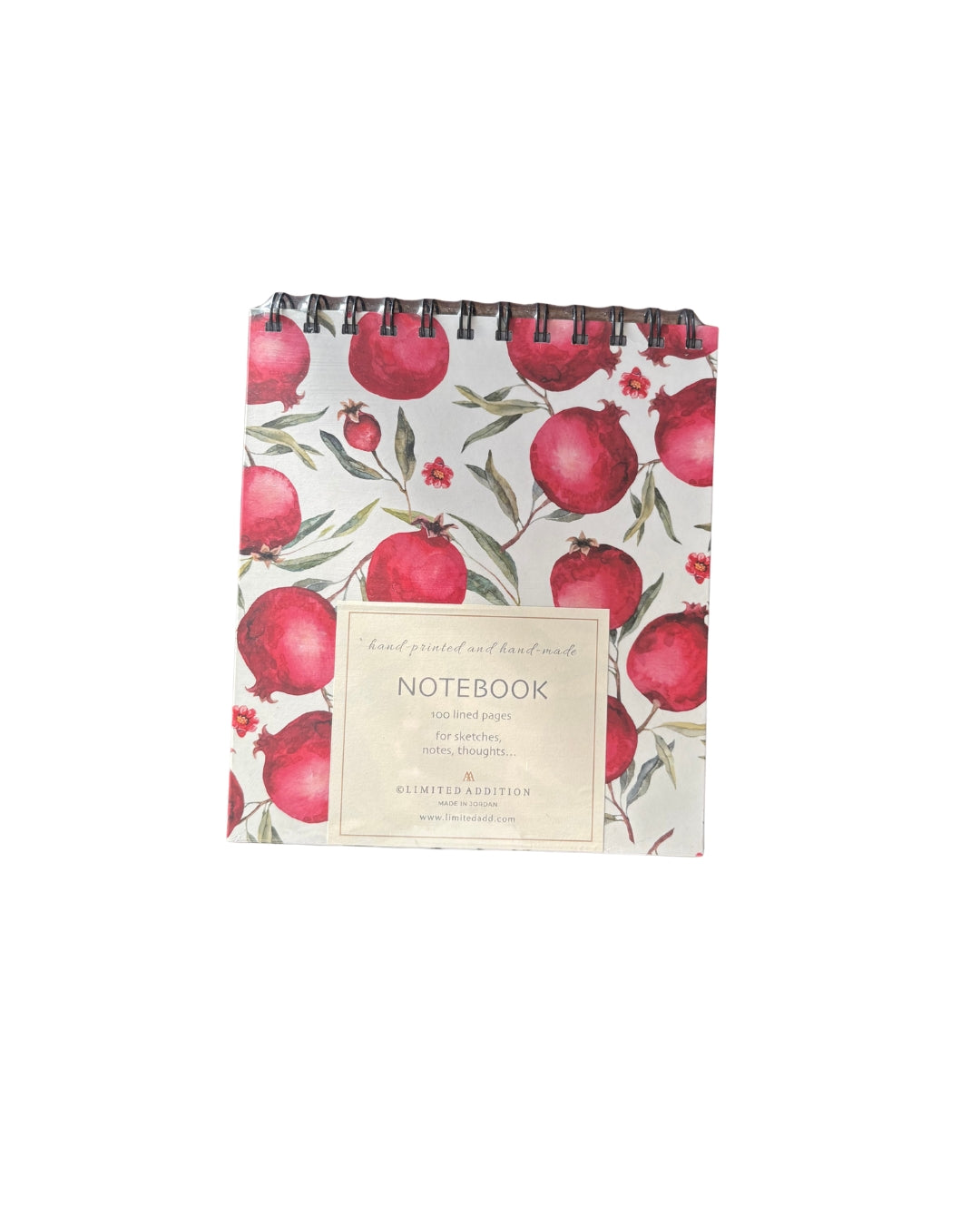 Notebook with pomegranate design on a white background