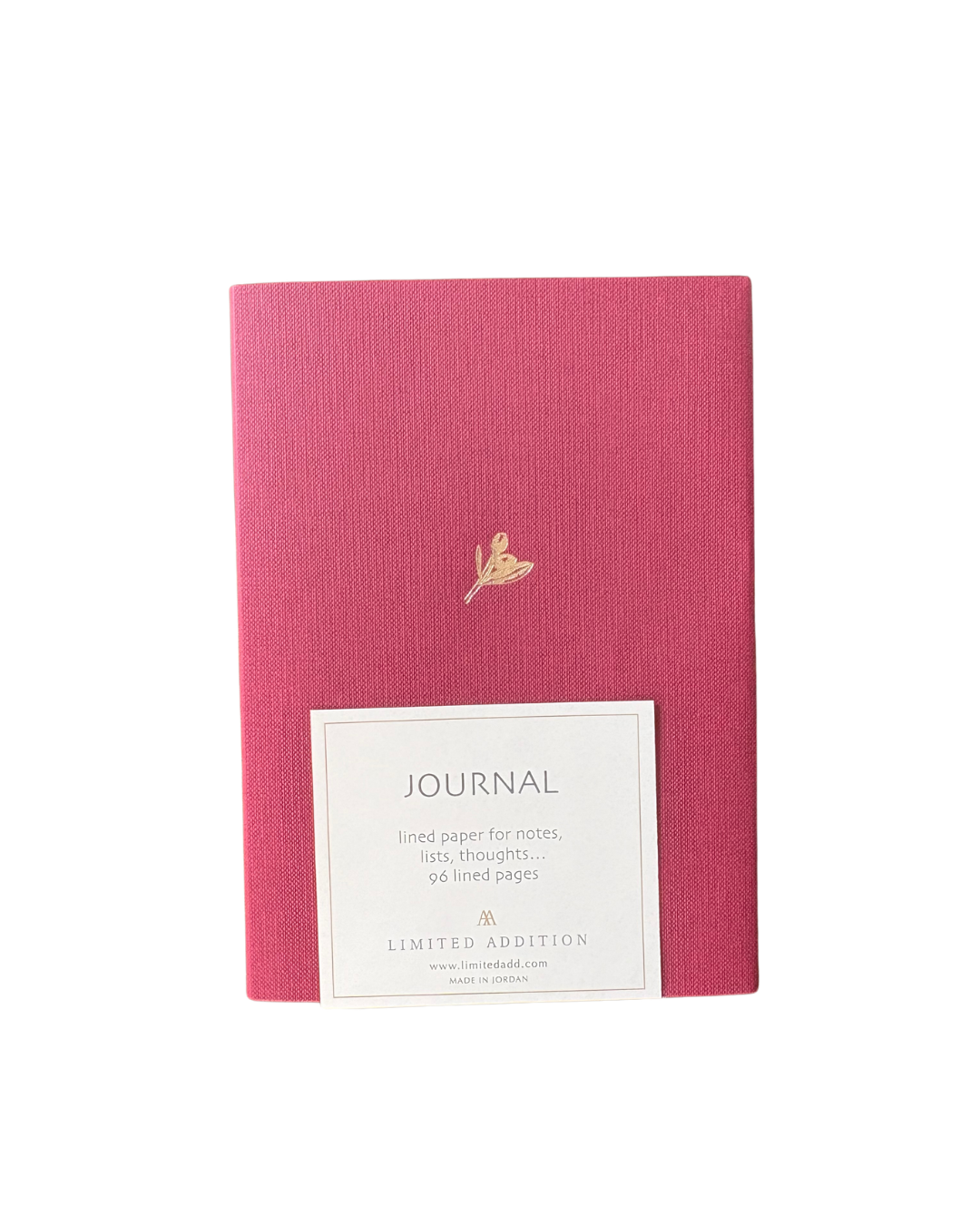 Pink journal with a gold emblem and label on a white background