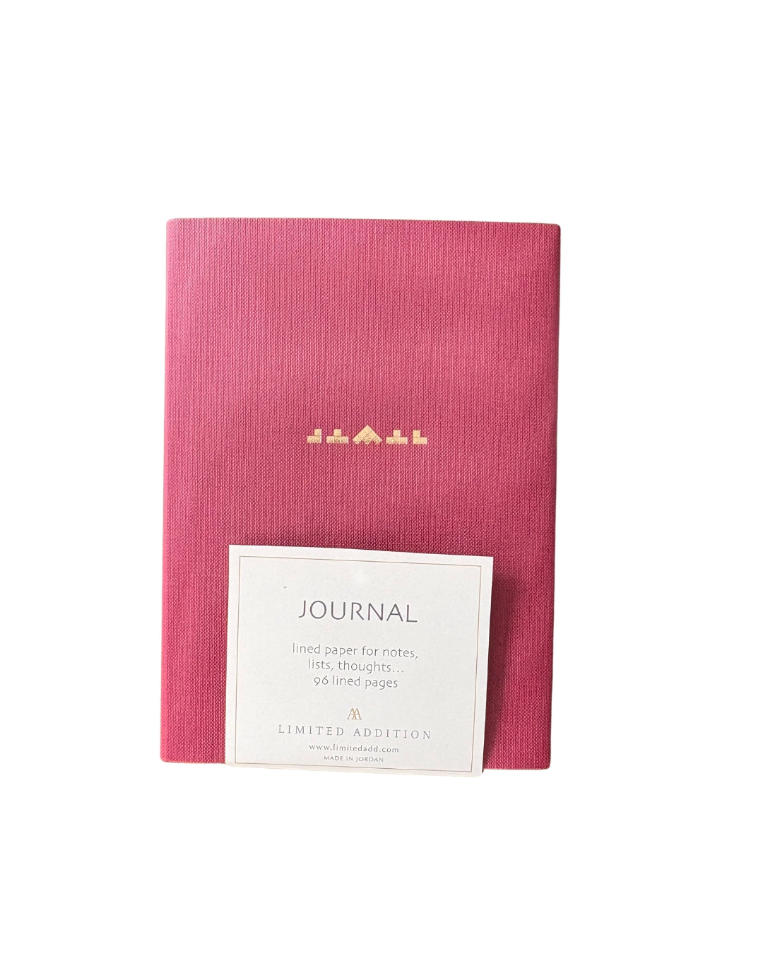 Pink journal with a white label on a white background