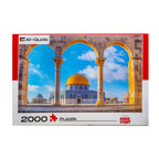 Puzzle box with a scenic view of a domed building through arches, featuring 'Al-Quds' branding.