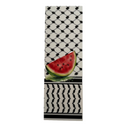 Towel with a watermelon slice design on a black and white patterned background