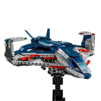 Toy spaceship model on a stand with a white background