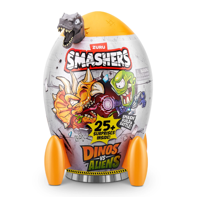 Toy packaging with dinosaur and alien design, featuring Zuru Smashers branding.