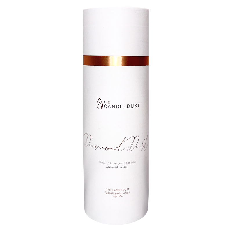 White bottle with gold band labeled 'The Candledust Diamond Dust' on a white background