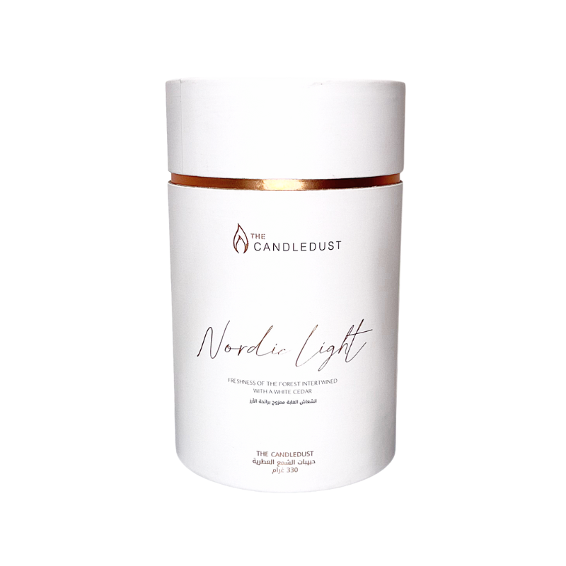White container with gold band labeled 'The Candledust Nordic Light' on a white background