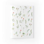 Notebook with floral pattern on a white background