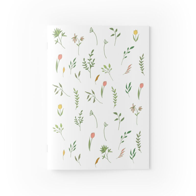 Notebook with floral pattern on a white background