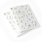 Notebook with floral pattern on a white background